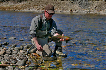 Zach Pleshar with Boulder River rainbow trout